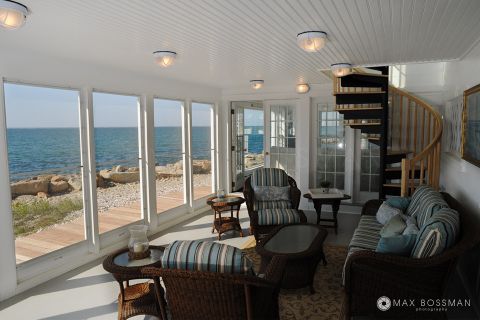 Oceanview property on Martha&#039;s Vineyard - screened in porch with spiral staircase to upper deck